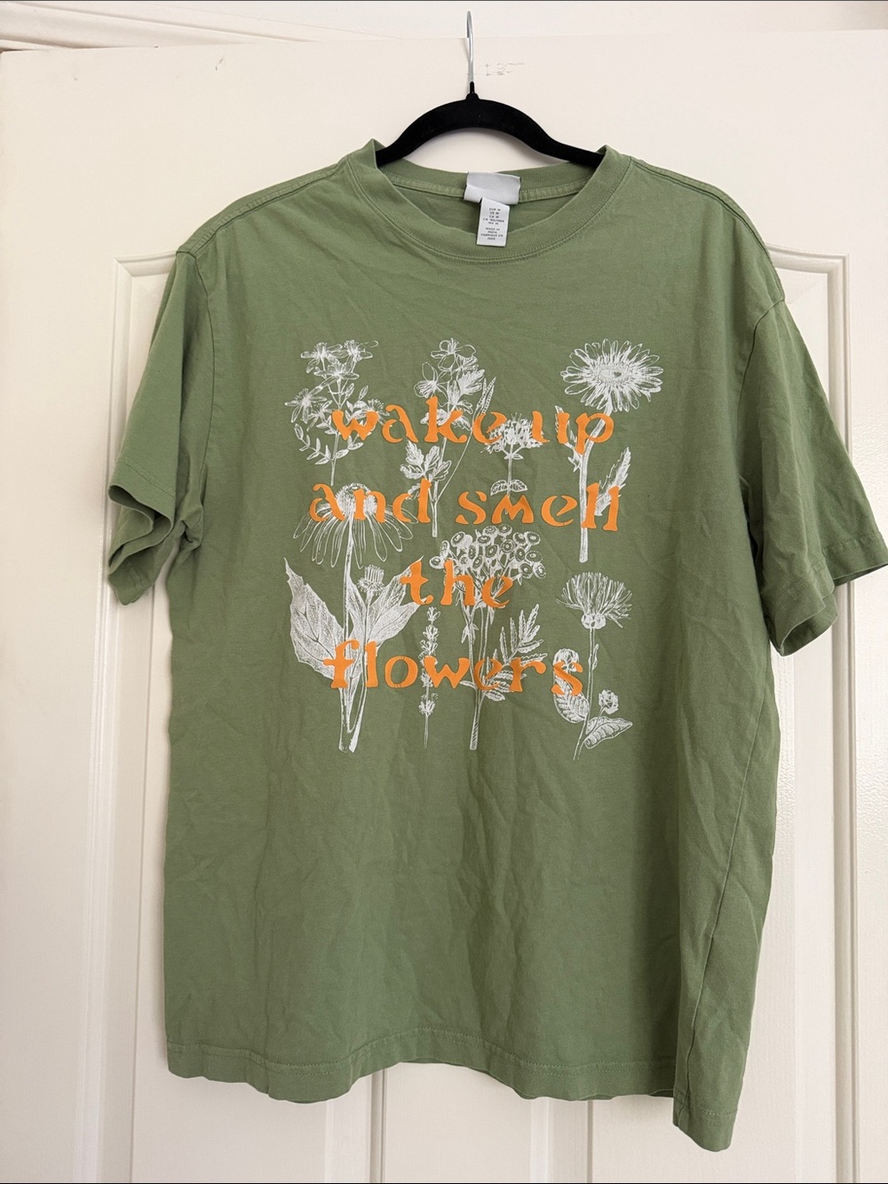 H&M Olive Green Short Sleeve Tee with White Floral & Orange Text
